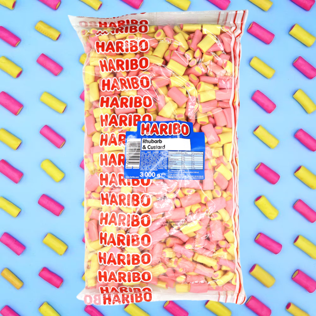 Bag of Haribo gummy candies on a blue background with scattered pink and yellow candies.
