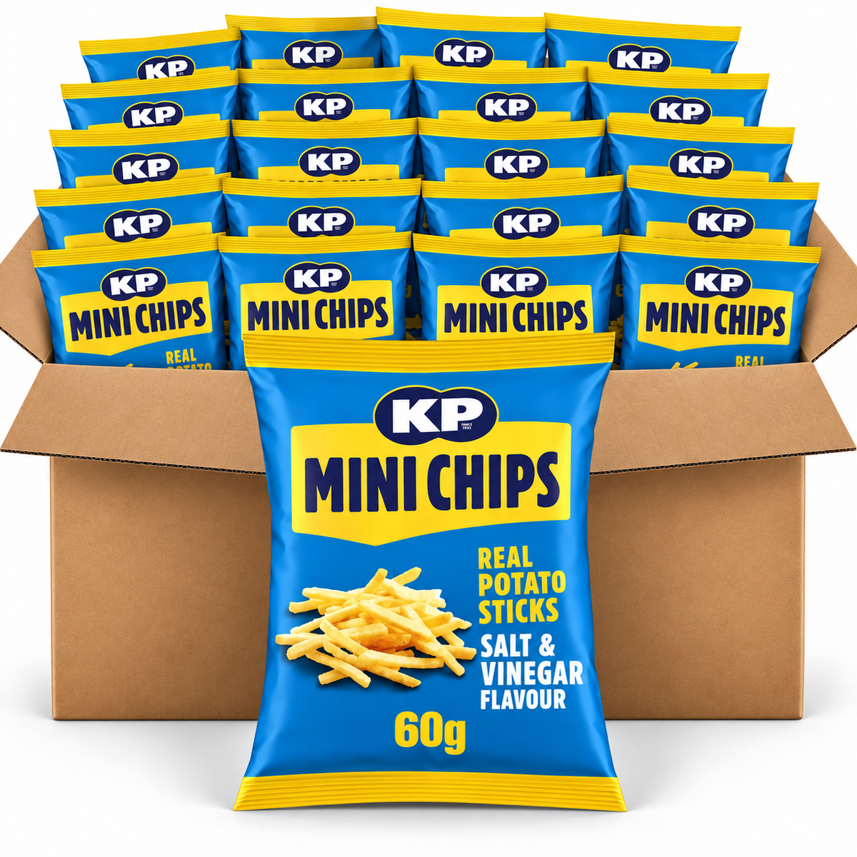 A bulk display of KP Mini Chips salt and vinegar flavor potato sticks, with a single 60g bag in the foreground and multiple 60g bags arranged inside a large brown cardboard box behind it.